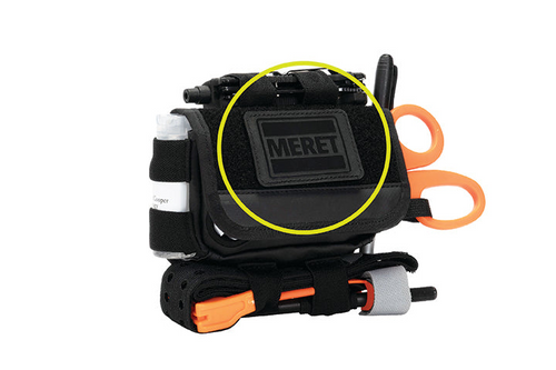 Add a MERET logo badge to any plate area with these MERET panels.  Reflective logo on navy, red, and high viz; black logo on black.  Infection control material with hook backing.
