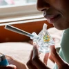 lady holding joint bubbler