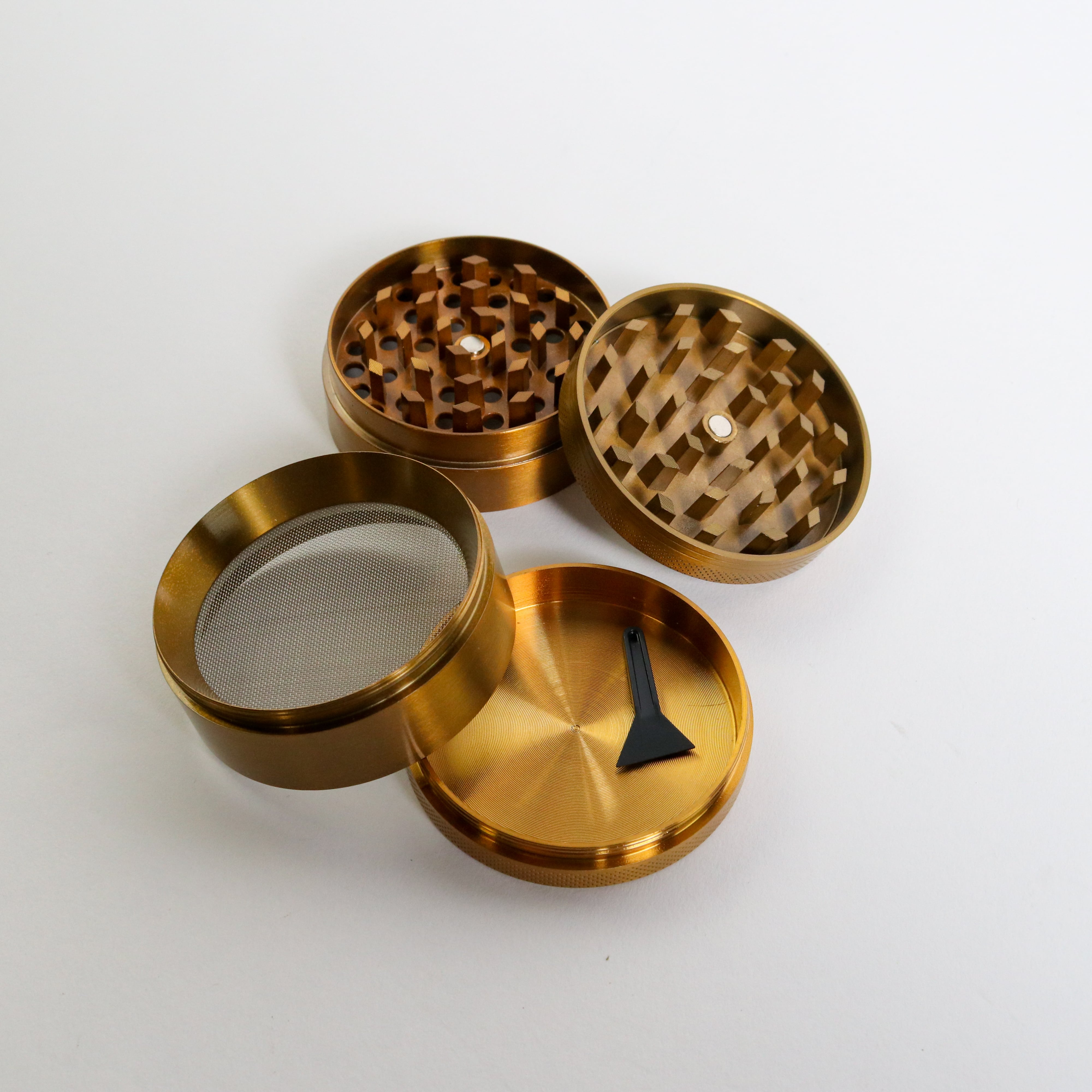 https://cdn11.bigcommerce.com/s-rnyk1y1kw8/product_images/uploaded_images/sesh-grinder-gold-0004-min.jpg?t=1643674357