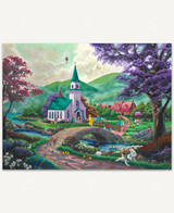  Easter Sunday wooden jigsaw puzzle reveals a scene outside a church where children are having an Easter egg hunt. Two kids walk over a stone bridge to follow a trail of eggs that leads to the Easter Bunny. Mountains fill the background, and an Easter egg hot air balloon floats in the sky with bunny and egg-shaped clouds. 