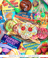  Close-up of Banana Split wooden jigsaw puzzle illustrating a vibrant display of ice cream and various toppings on a table with vintage ice cream signs and posters. From a birds-eye view, a banana split served in a gold dish sits in the center of the table surrounded by strawberries, a banana, cherries, sprinkles, caramel, chocolate, and sugar cones. 