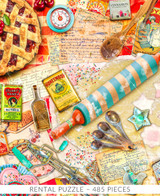  Close-up of Vintage Baker wooden jigsaw puzzle displaying a flat surface covered in baking supplies, ingredients, recipe cards, and baked goods. 