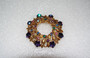 Vintage Wreath Pin Rare Margarite Midnight Blue Glass Flower Stones Rich Gold Plated Metal Gorgeous!