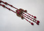  Art Deco Max Neiger Czech Ornate Brass Red Glass Necklace Long Dangles