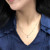 Diamond Wish 1/2 Carat Round Moissanite Solitaire Pendant Necklace in 14k Rose Gold (H-I, 5 mm) 4-Prong 16 to 18 Inch Adjustable Chain Spring Ring