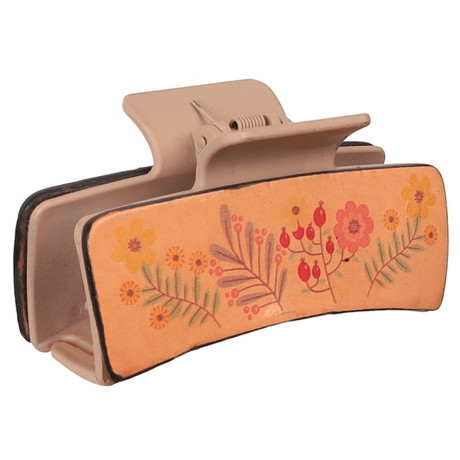 In Bloom 4-inch claw clip with floral botanical design in warm tones.