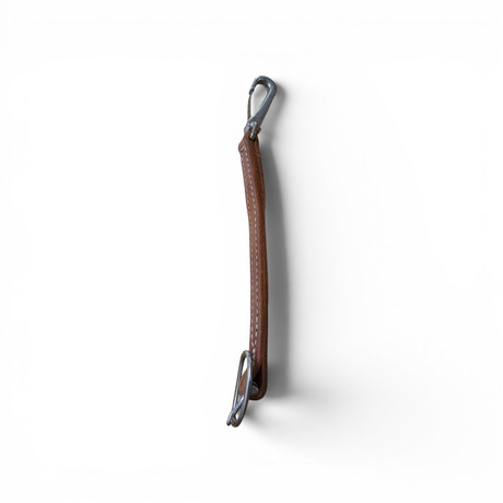 Brown leather rear cinch connector strap with metal snap and ring for western saddle rigging