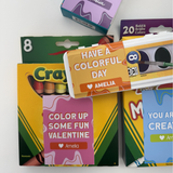Art supply Valentine stickers on crayons, markers, and watercolors