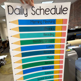 Blue and Green pencil schedule clings with a Daily Schedule header on their backing sheet