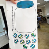 Blue and Green marble jar reward system clings held up to show the reusable static cling