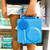 Capri Blue OmiePod utensil pod looped on a blue OmieBox handle