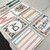 Retro Brights printed alphabet poster, shape poster, and labels on a classroom table