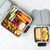 Bento Five packed with a sandwich, fruit, veggies, and snacks