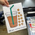 Totally Custom iced coffee reward system clings held up to show the reusable static cling