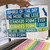 Blue and Green Number of the Day clings held up on their backing sheet