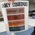Earth Tones Daily Schedule header with Language Arts, Math, and Social Studies clings on their backing sheet
