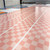 Close-up of printed Pink and Purple checkered whiteboard cling border strips