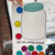 Rainbow All Smiles incentive jar reward system clings held up to show the reusable static cling