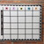 Pastel Weekly Focus Monday through Friday whiteboard clings on a classroom whiteboard