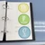 Round pastel CHAMPS letters for movement, participation, and success stored in a Binder Ready sheet