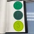 Round Blue and Green CHAMPS letters for movement, participation, and success stored in a binder