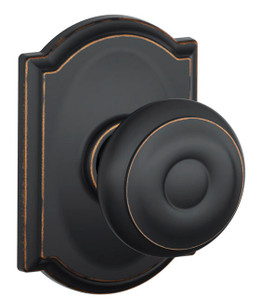 Schlage / Georgian Knob with Camelot Rose / Passage / Aged Bronze / F10GEO 716 CAM