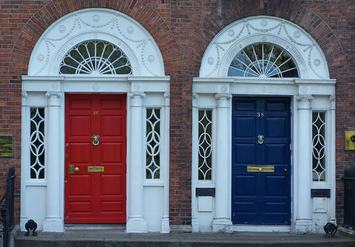 Two doors beside each other with different deadbolt lock types