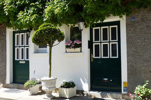 two doors identical except one lacks a deadbolt or door knob