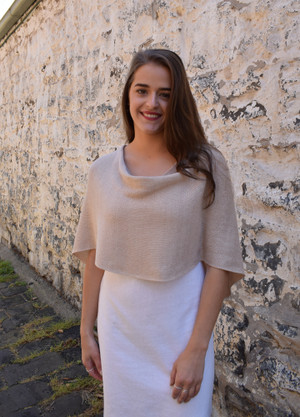 Petite poncho, mushroom - worn with seam at back
