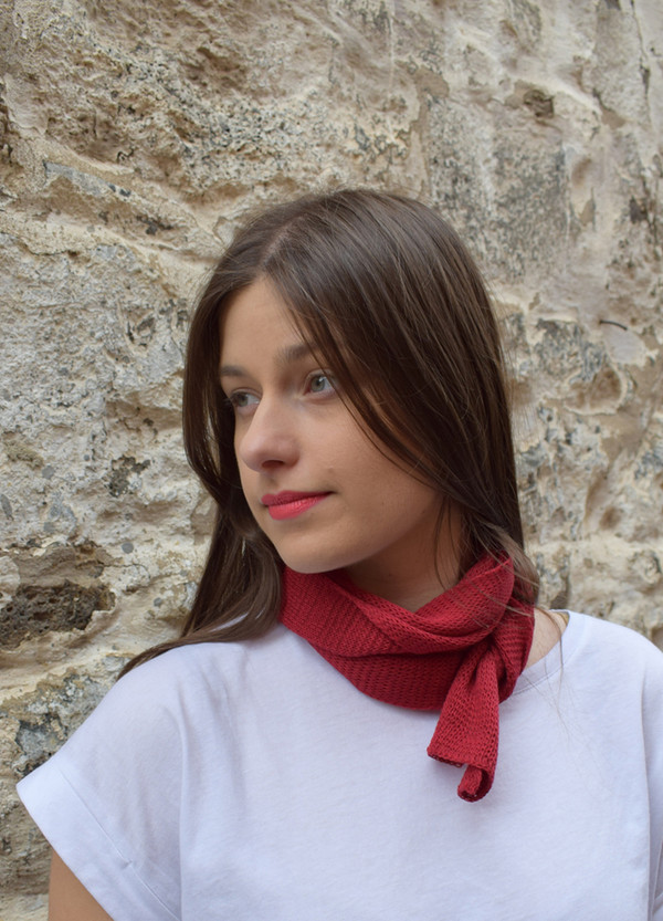 red, worn as neck scarf