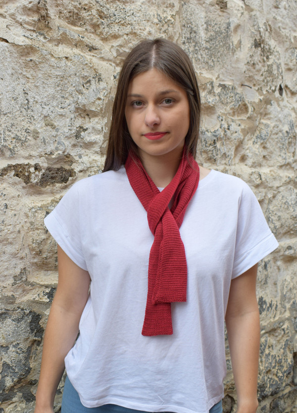 red, worn as neck scarf