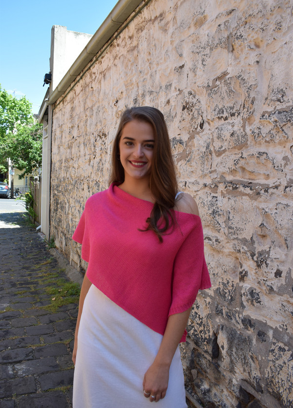 Petite poncho, pink - worn with seam at shoulder