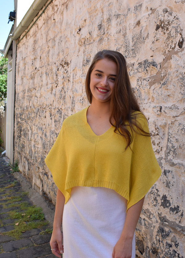 Petite poncho, mango - worn with seam at front