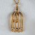 Sylvie Monthule Women's Gold Bird in a Cage Pendant Necklace