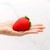 Buy the Strawberry 16-function Rechargeable Silicone Emoji Suction Vibrator in Red & Green - Emojibator