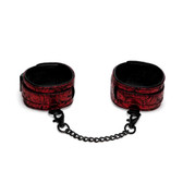 Buy the Fifty Shades of Grey Sweet Anticipation Reversible Black & Red Adjustable Ankle Cuffs with Chain - LoveHoney