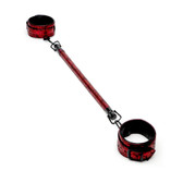 Buy the Fifty Shades of Grey Sweet Anticipation Reversible Black & Red Spreader Bar with Cuffs - LoveHoney