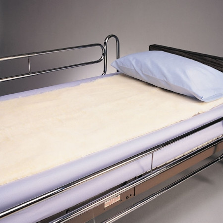 SkiL-Care Synthetic Sheepskin Bed Pad, 60 x 30 Inch in use