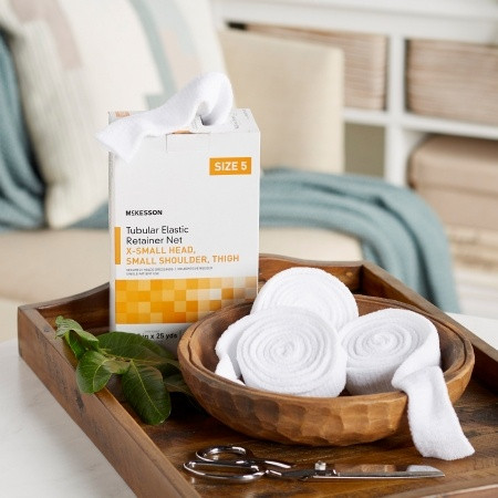 Elastic Net Retainer Dressing McKesson Tubular Elastic 14-1/2 Inch X 25 Yard Size 5 White X-Small Head / Small Shoulder / Thigh NonSterile in home setting