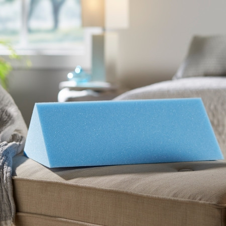 McKesson Foam Wedge Pillow, Small - 8 x 18 x 8 Inch in home setting