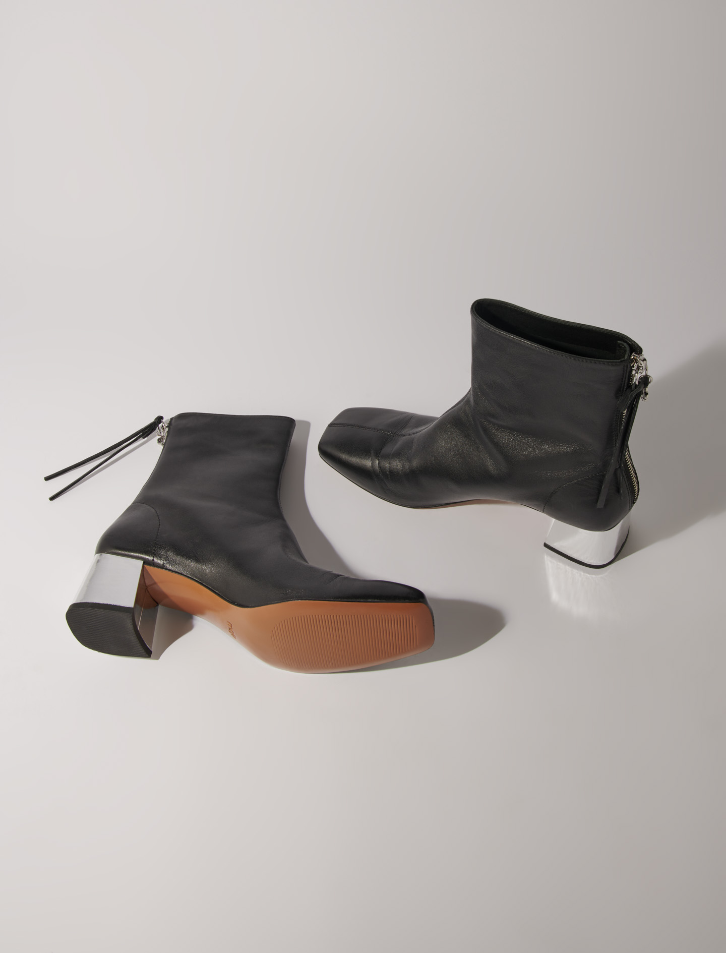 Khaite マファ スクエアトゥ アンクルフツ F1066726 910 Khaite Marfa ankle boots for Women - Black in UAE | Level Shoes