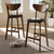 Baxton Studio Eline Mid-Century Modern Black Faux Leather Upholstered Walnut Finished Bar Stool Set