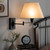 Baxton Studio Klasina Transitional Black Metal Swing Arm Wall Sconce Lamp