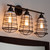 Baxton Studio Lieke Vintage Industrial Dark Bronze Metal 3-Light Cage Wall Sconce Lamp