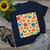 Whimsical Garden Play - Women’s Maple Tee 