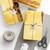Gentle Giraffe Glow - Wrapping Papers