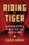 Riding the Tiger: Vladimir Putin's Russia and the Uses of War