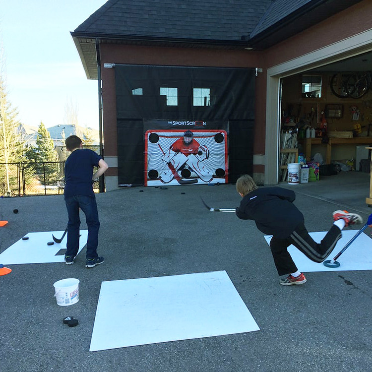 The SportScreen Remote Controlled Rollup Shooting Tarp + Shooting Pad Bundle from xHockeyProducts.ca Canada