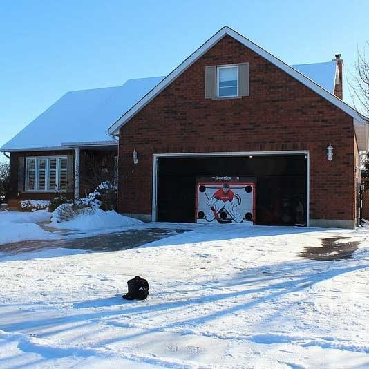 The SportScreen Remote Controlled Rollup Shooting Tarp + Shooting Pad Bundle from xHockeyProducts.ca Canada