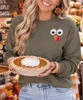 embroidered turkey face sweatshirt model image close up